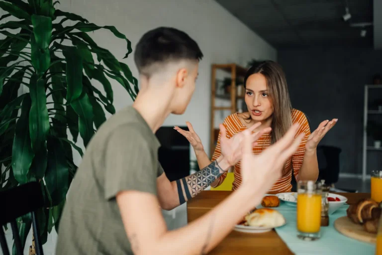 Same sex couple arguing at home. They are stuck in a conflict cycle of constant fighting.