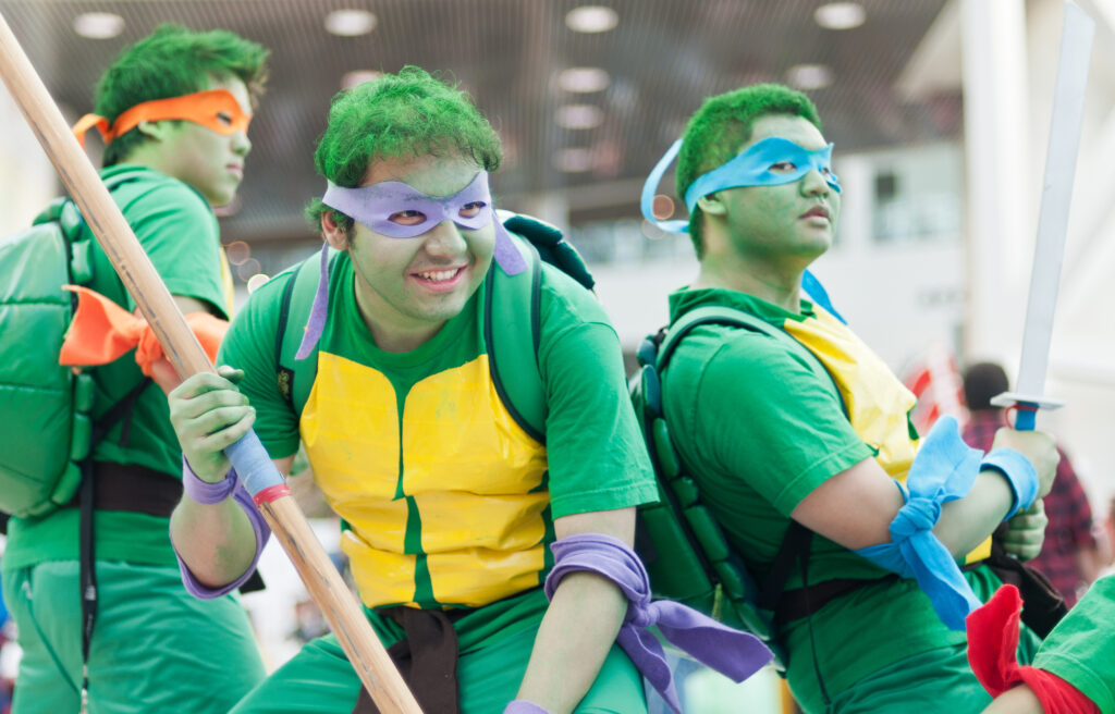 Cosplayers dressed as Teenage Mutant Ninja Turtles at Anime Expo.