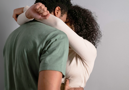 Coach_Argument_CoupleHug