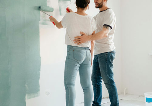 Coach_BuildingBetterLife_CouplePainting