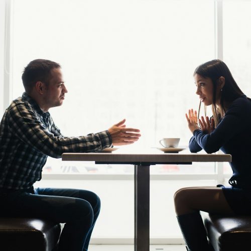 Scene in cafe – couple conflict arguing during the lunch. Scene in cafe - couple conflict arguing during the lunch.